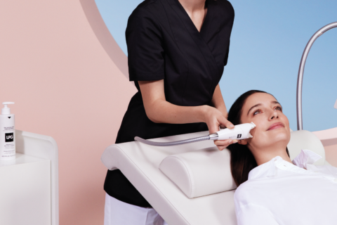 Woman receiving endermologie treatment on her face